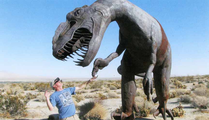 The Gobens always made time for play. Here Rich is seen in Borego, cutting up with a T Rex.